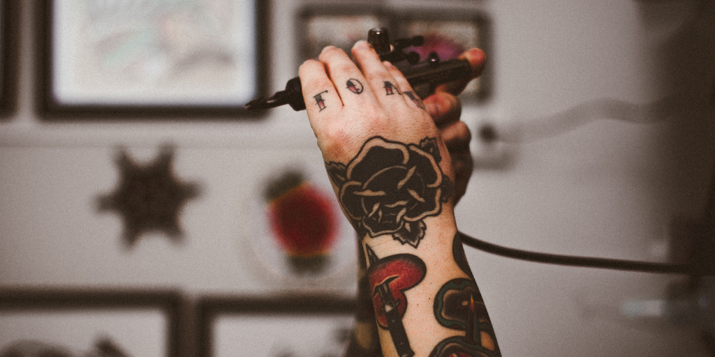Tattoo artists' job a pain in the neck: study - Chiropractic + Naturopathic  DoctorChiropractic + Naturopathic Doctor